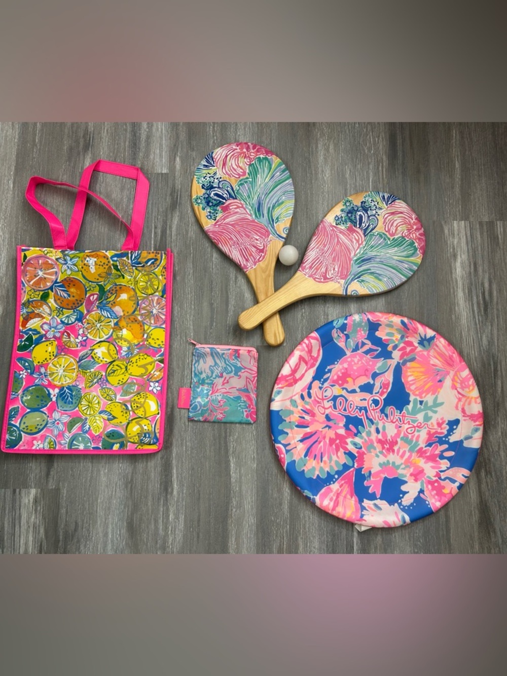Lilly Pulitzer bundle: paddle ball set, 1 flying disc, 1 beach pouch, 1 gift bag